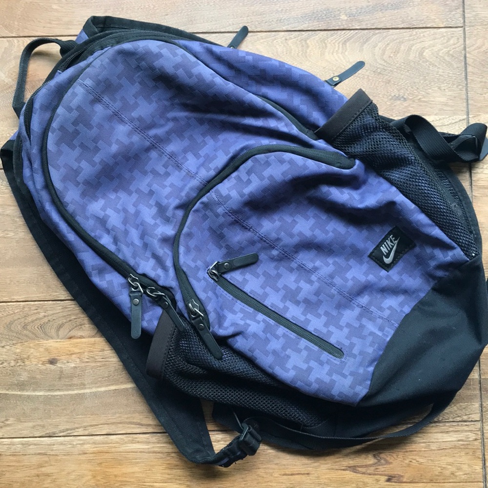 Purple and black Nike backpack (laptop compatible)